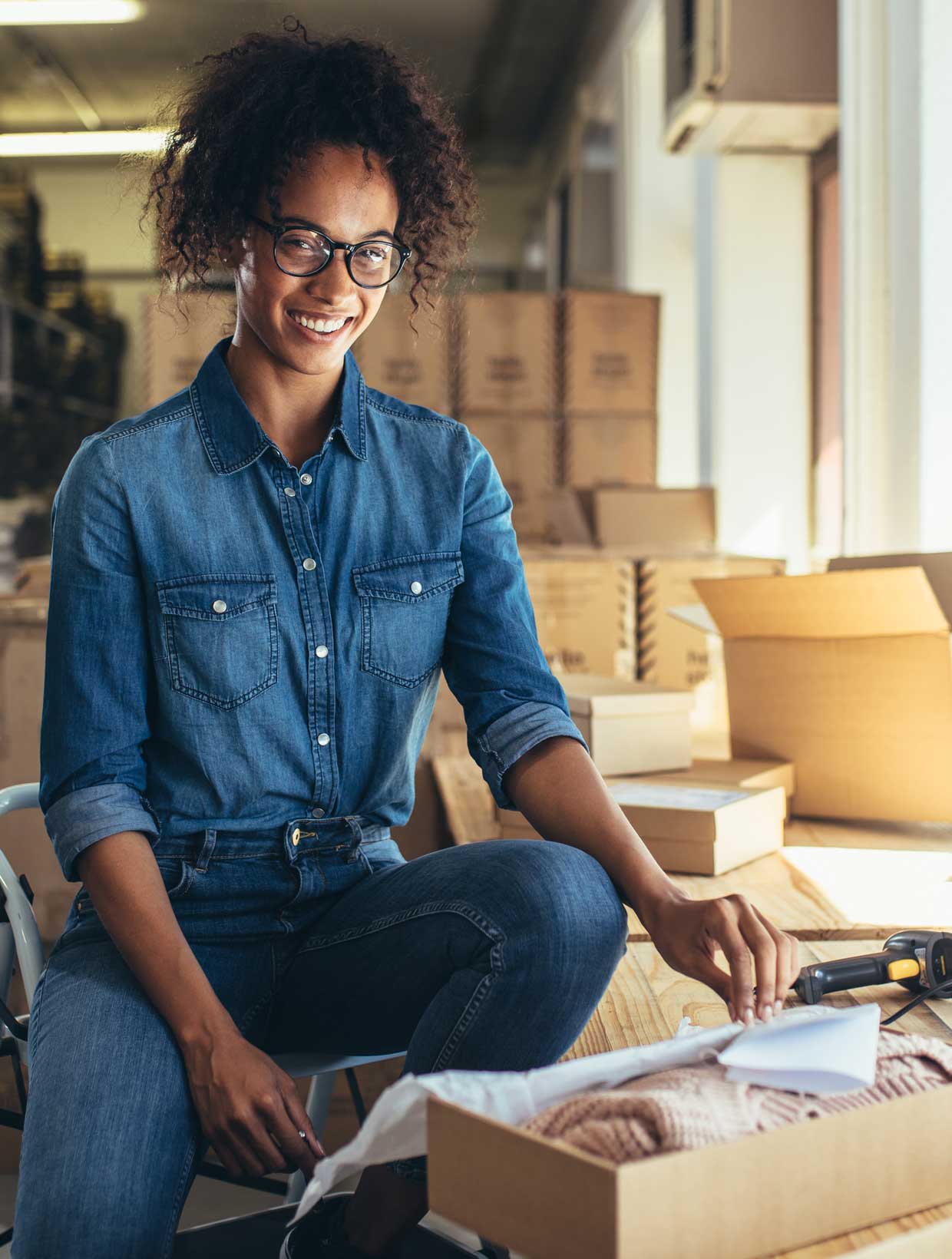 800x800 Wholesale Shipping & Packing Supplies - smiling woman packaging wholesale boxes